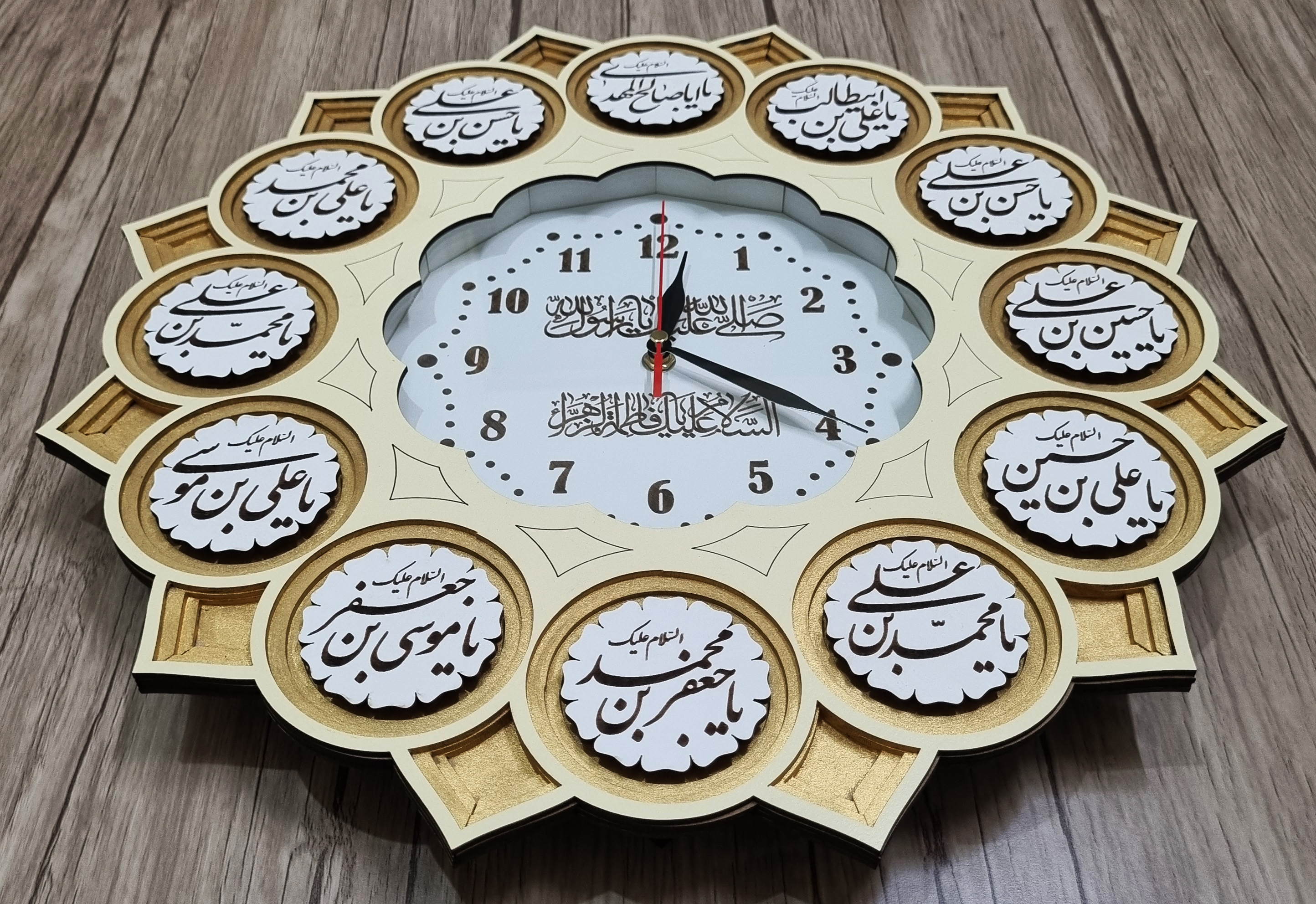 ساعت دیواری طرح مذهبی مدل لبخند طلایی